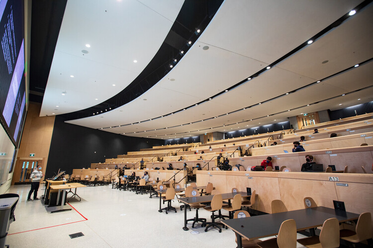 A large lecture hall with students